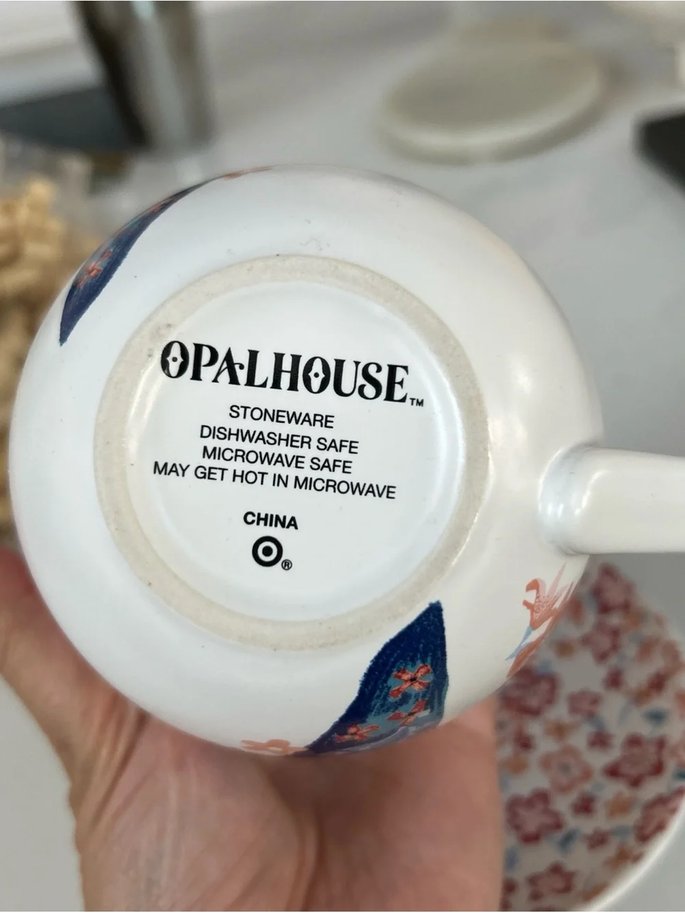 Opalhouse White Tea Cup and Saucer with Blue Peacock and Pink Floral Design